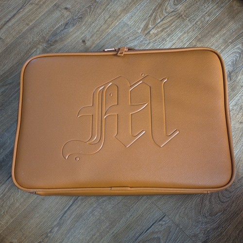 Made mitchell hard shell - by,